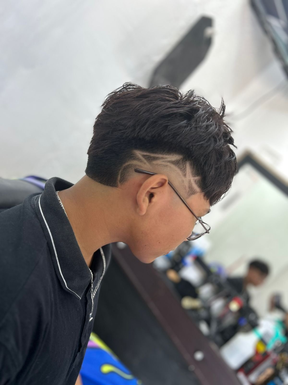 Barbero Legan trabajando